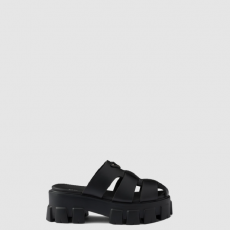 [PRADA-프라다]모놀리스 러버 뮬 슬리퍼